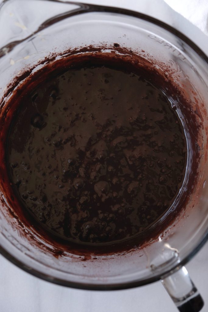 Glass mixing bowl with brownie batter
