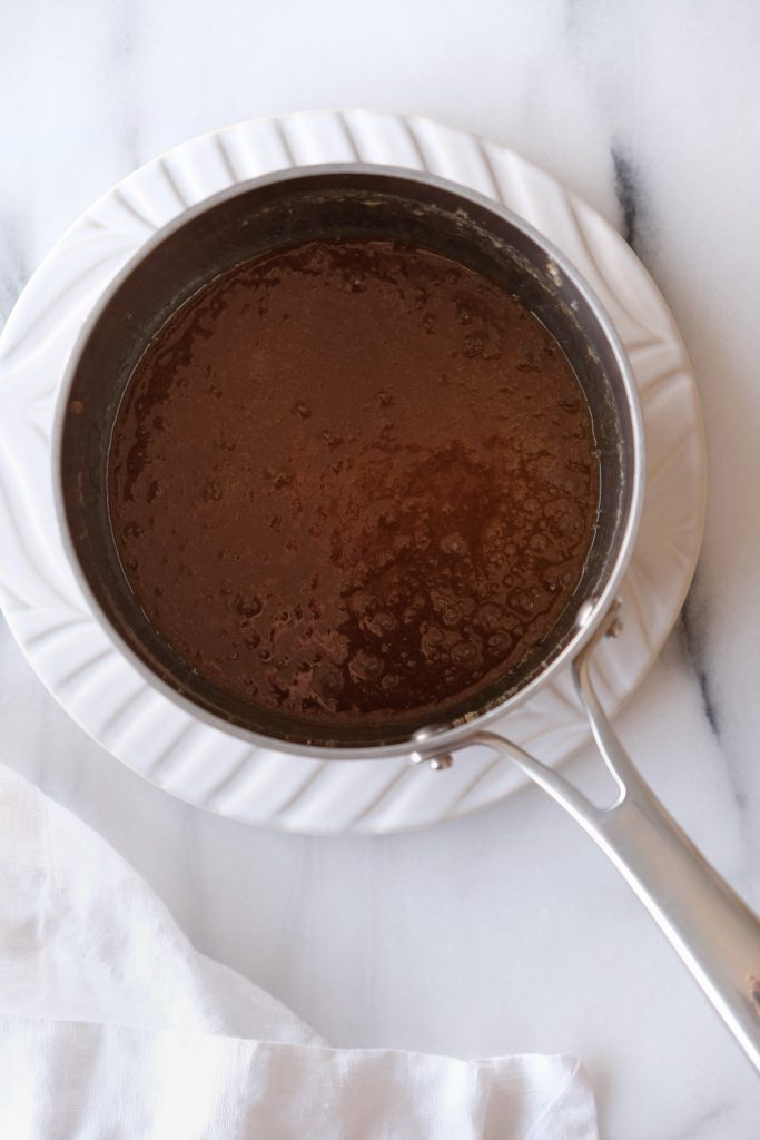 Melted butter and brown sugar mixture in a saucepan