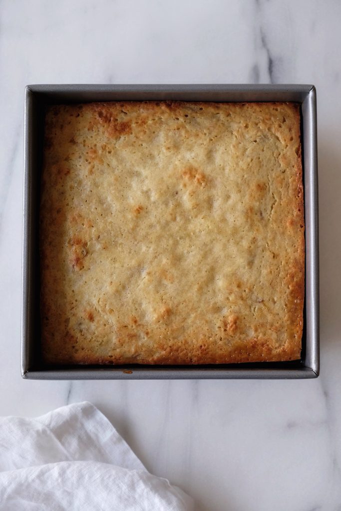 Square baking pan with baked caramelized banana upside down cake