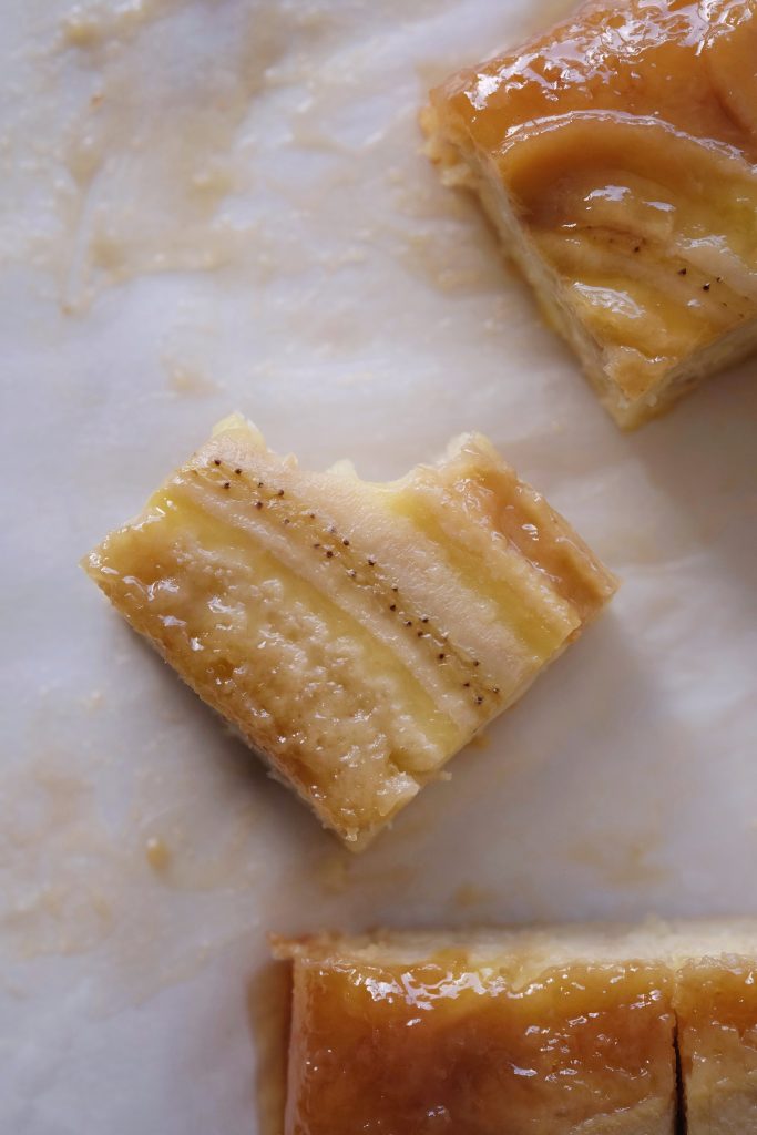 Square slices of caramelized banana upside down cake