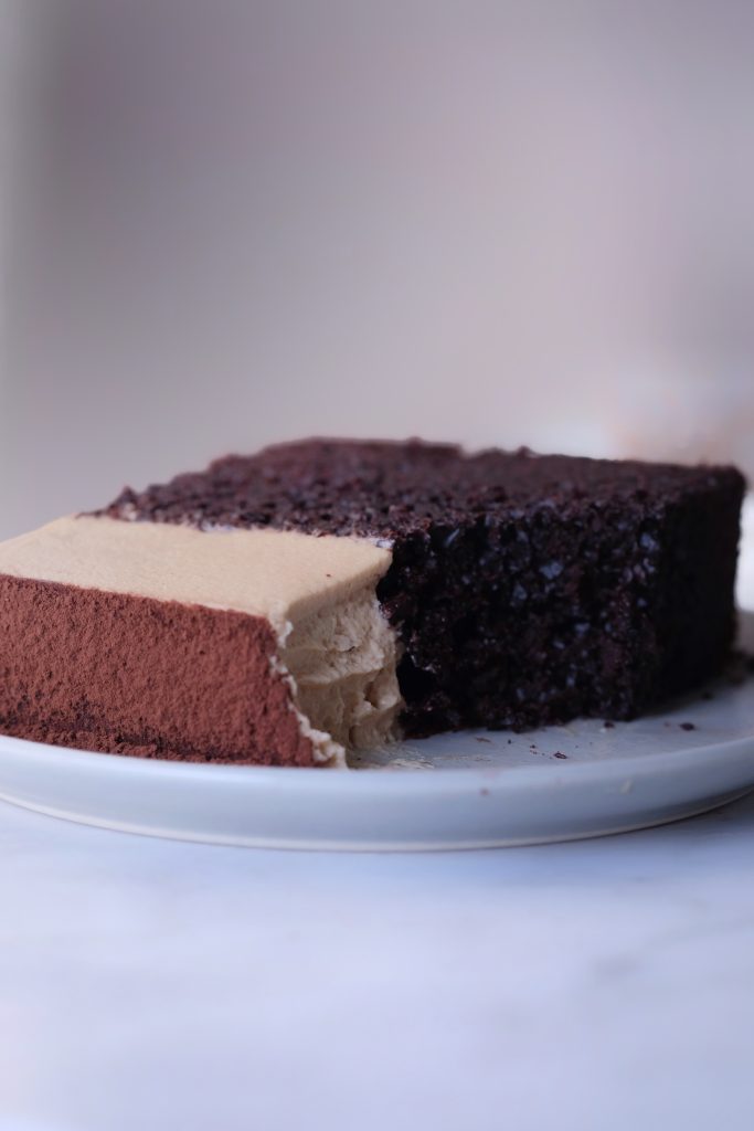 Slice of chocolate cake with coffee mascarpone cream