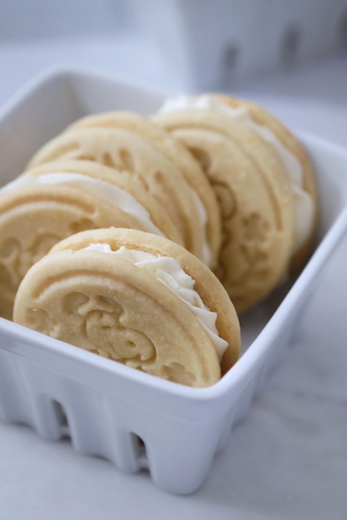 Carton of 4 lemon cheesecake sandwich cookies