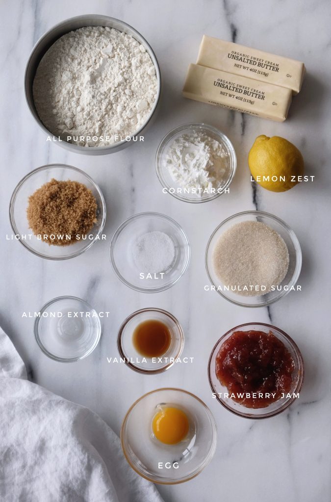 Ingredients used in strawberry lemon heart thumbprint cookies, placed in individual prep bowls
