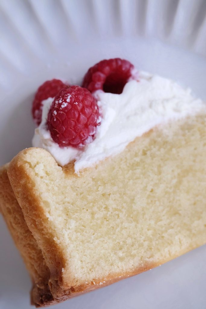 Slice of cream cheese pound cake on a plate